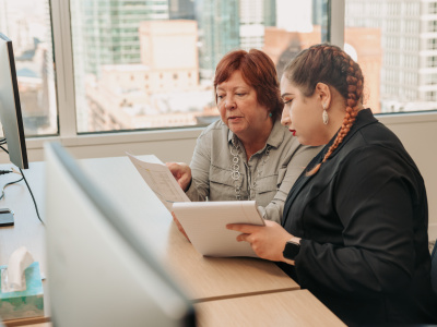 A Mentor and Mentee Work Together